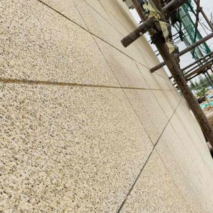 马鞍山 黄金麻花岗岩荔枝面外墙干挂石材效果示例