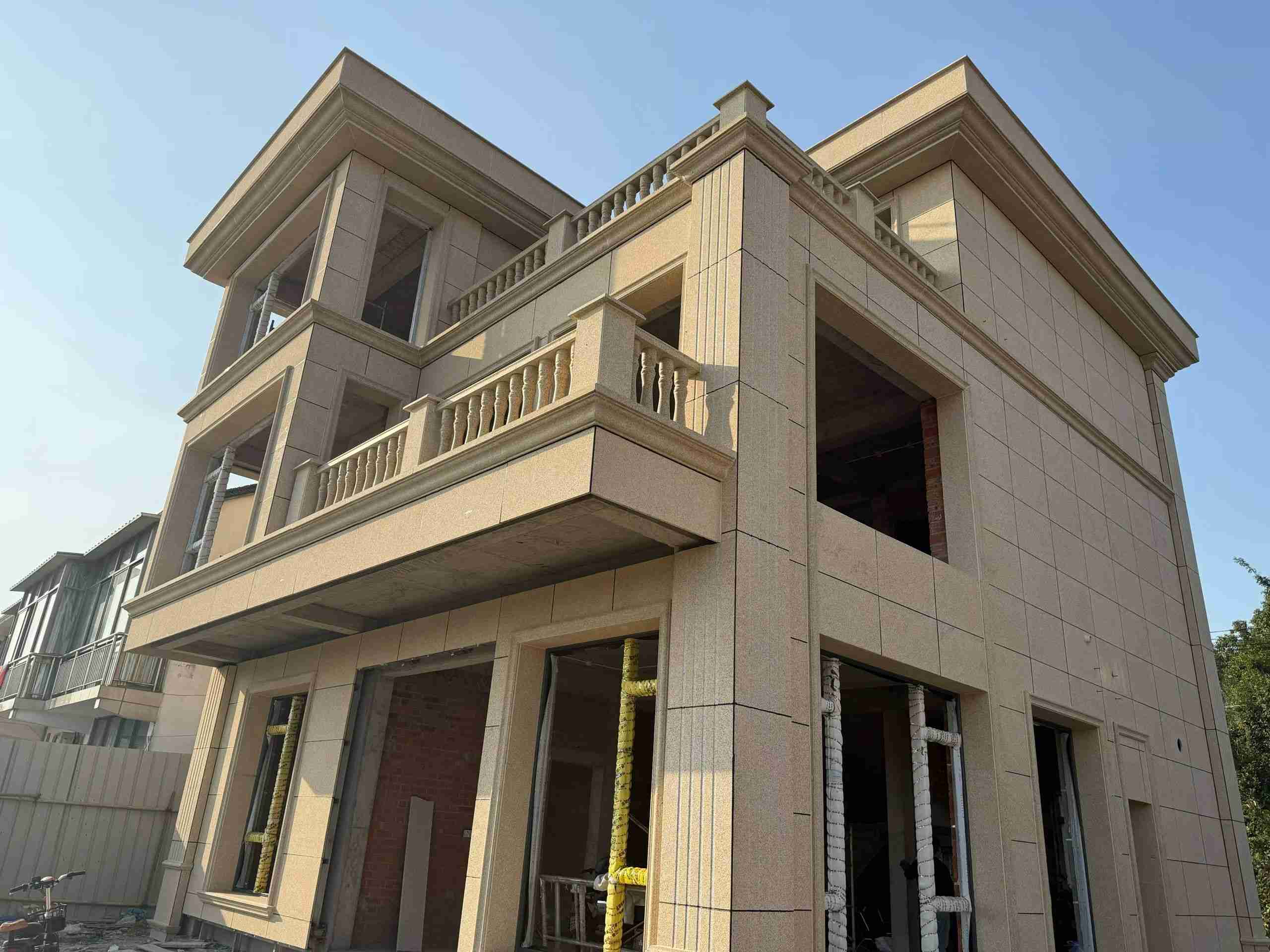 马鞍山 黄金麻花岗岩石材荔枝面外墙干挂效果展示